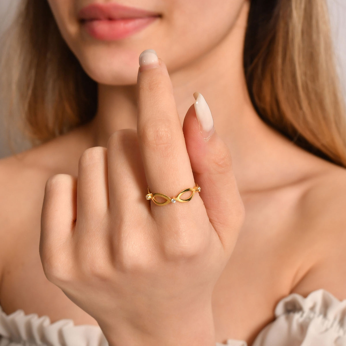 Gold vintage openwork ring worn on hand