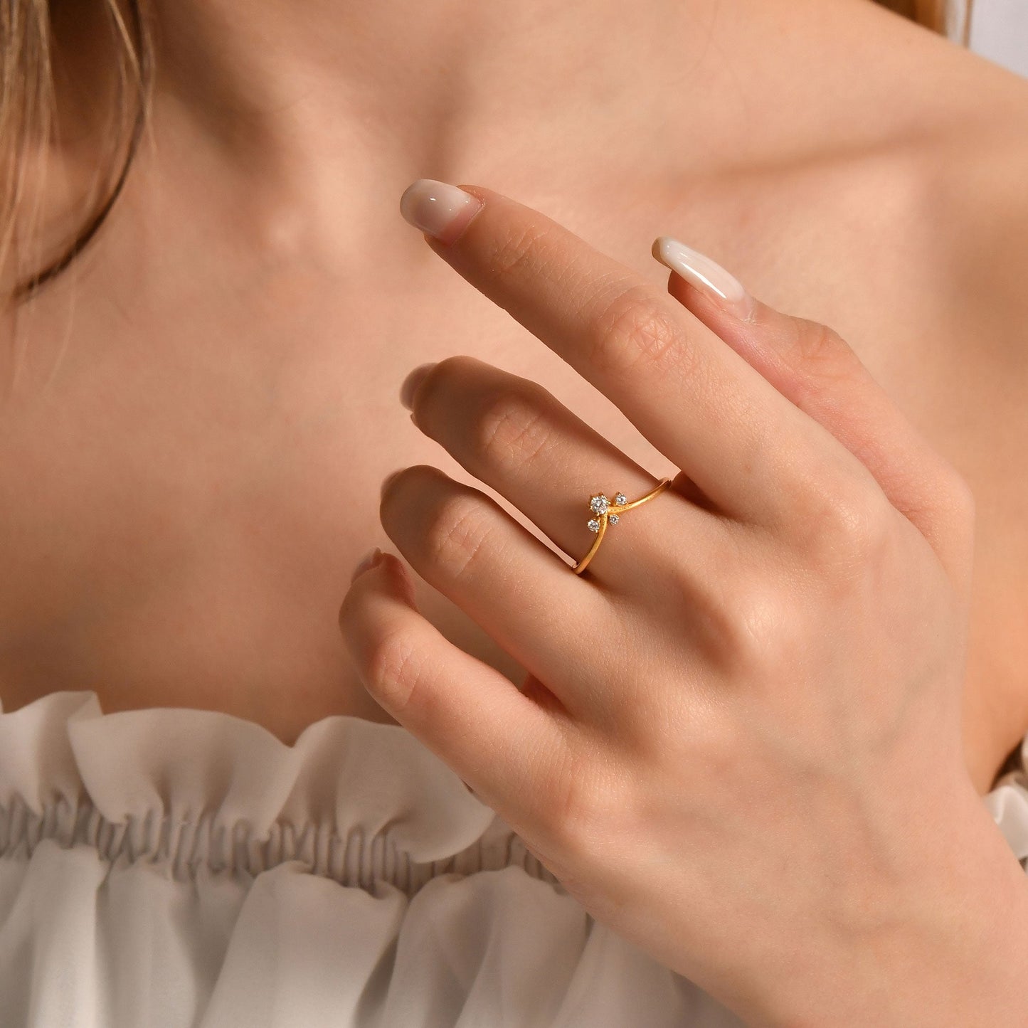 18K gold V curve diamond ring worn on hand