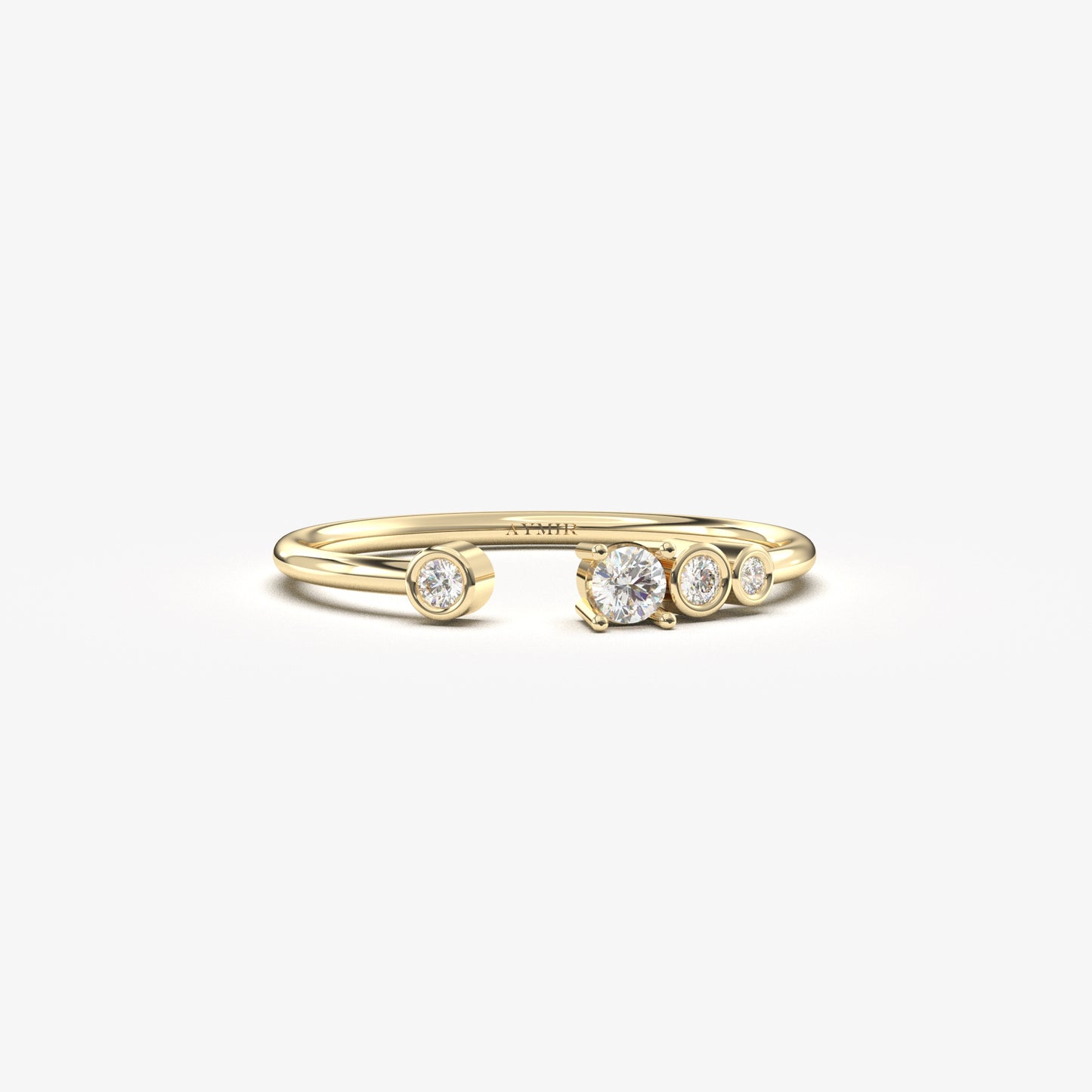 18K yellow gold open four stone bezel ring with cubic zirconia, front view
