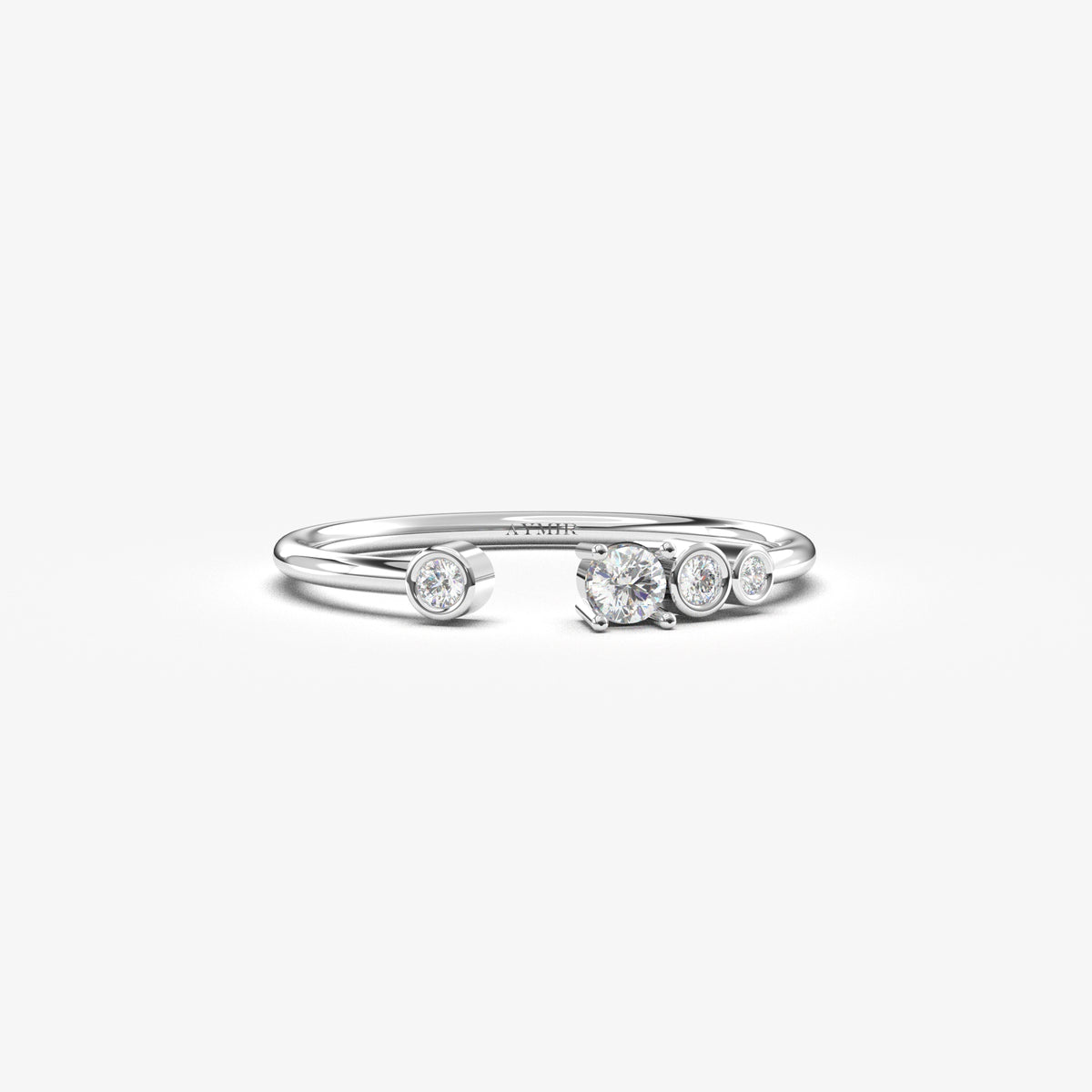 18K white gold open four stone bezel ring with cubic zirconia, front view