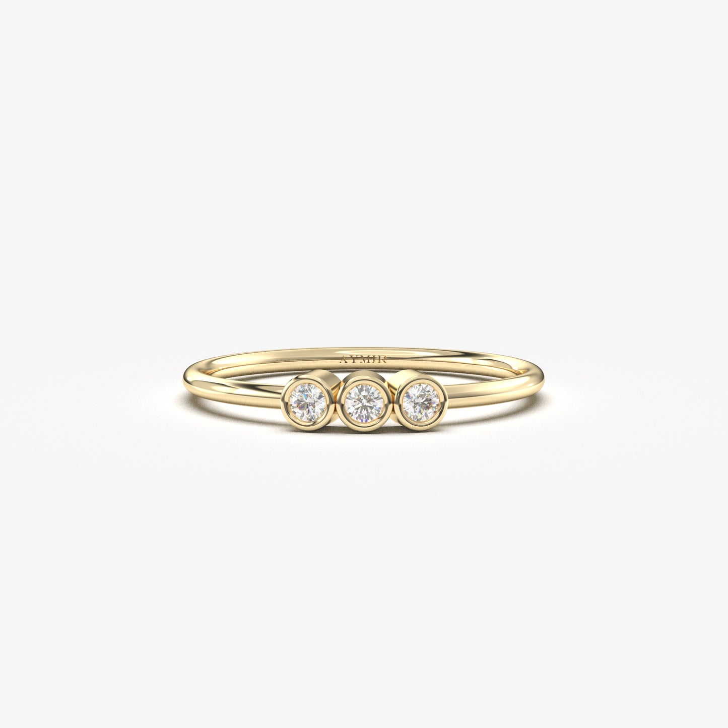 14K yellow gold three stone bezel ring with natural diamonds, front view