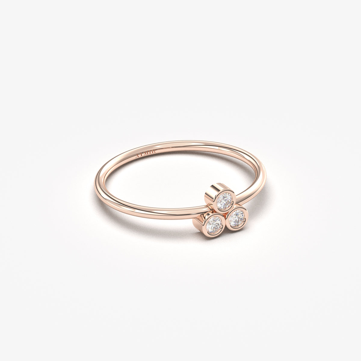 14K rose gold trefoil ring with natural diamonds, angled view