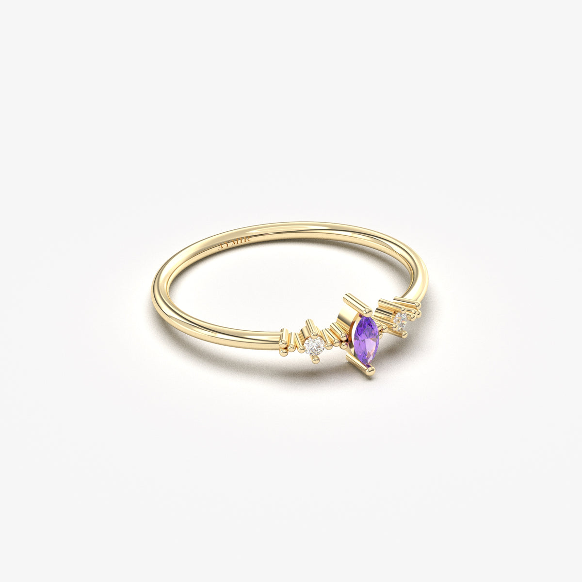 Yellow gold purple-stone marquise ring, side view