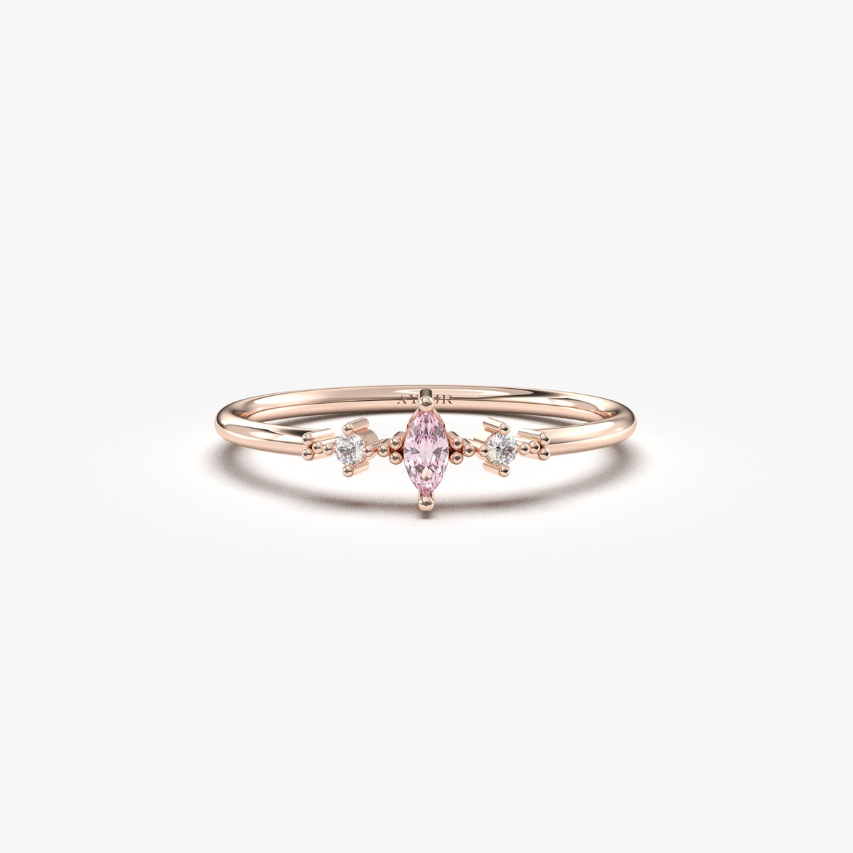 Rose gold pink-stone marquise ring, front view
