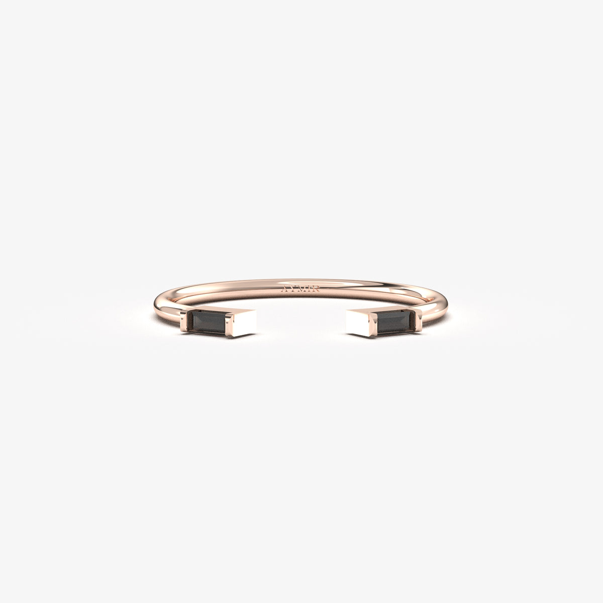 10K rose gold open baguette ring with black baguette stones, front view