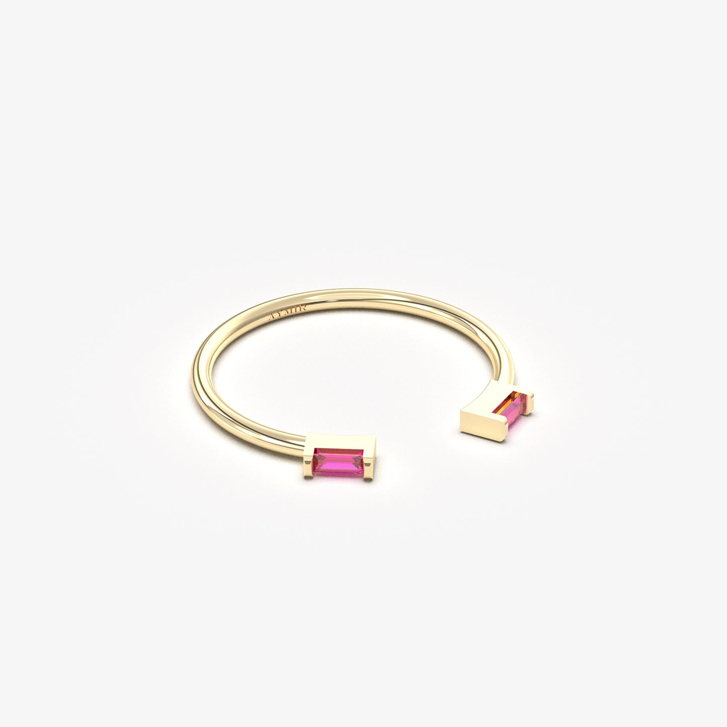14K yellow gold open baguette ring with red baguette stones, angled view