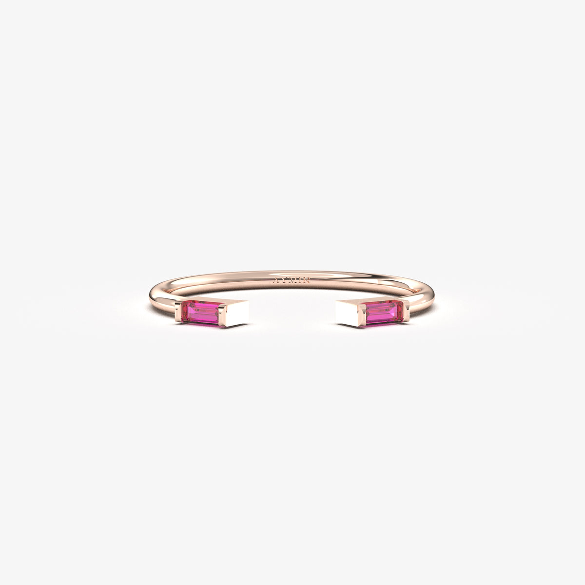 10K rose gold open baguette ring with red baguette stones, front view