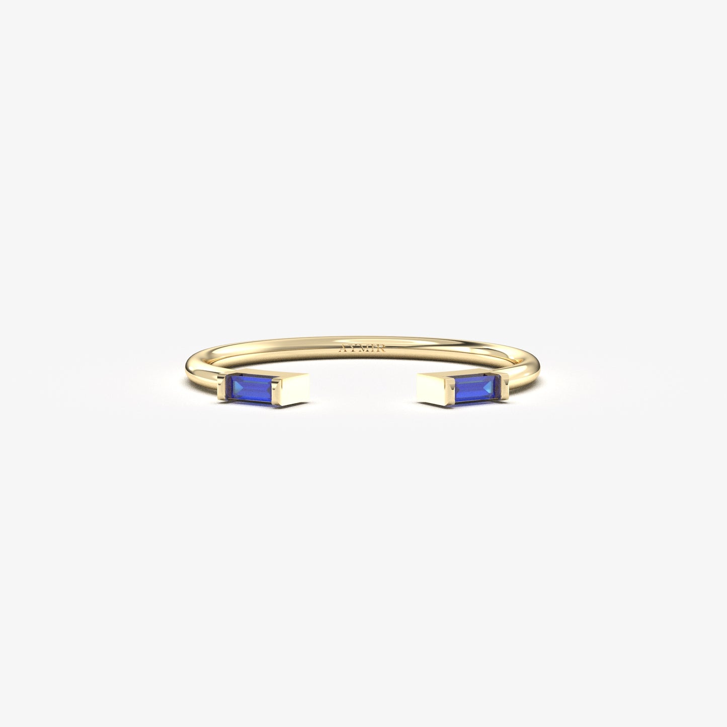 18K yellow gold open baguette ring with blue baguette stones, front view