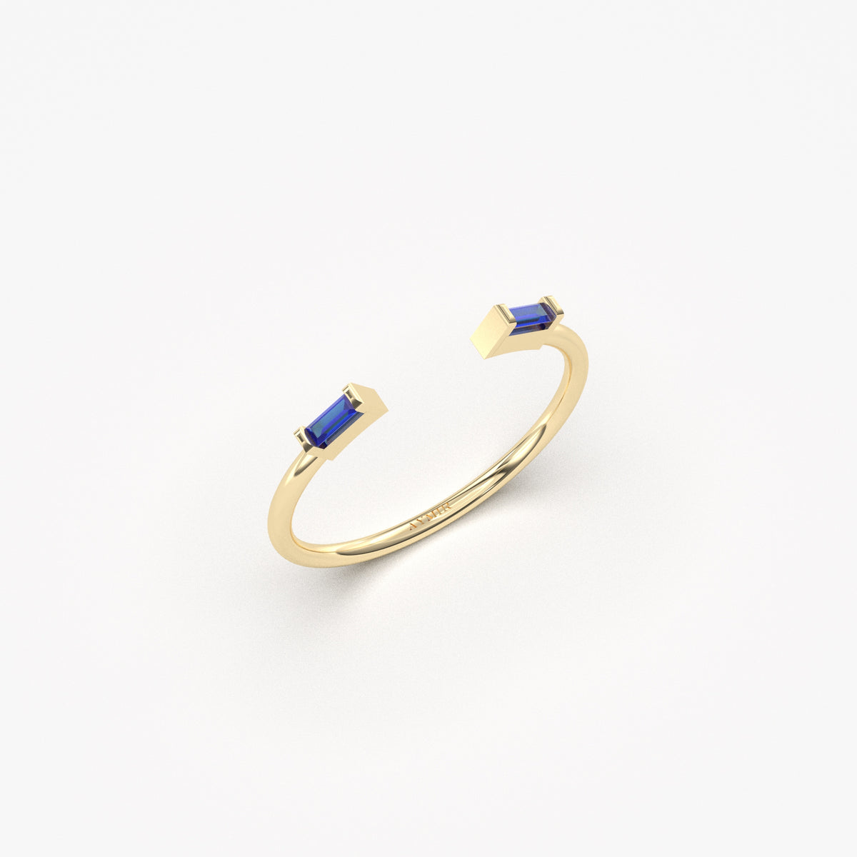 10K yellow gold open baguette ring with blue baguette stones, side view