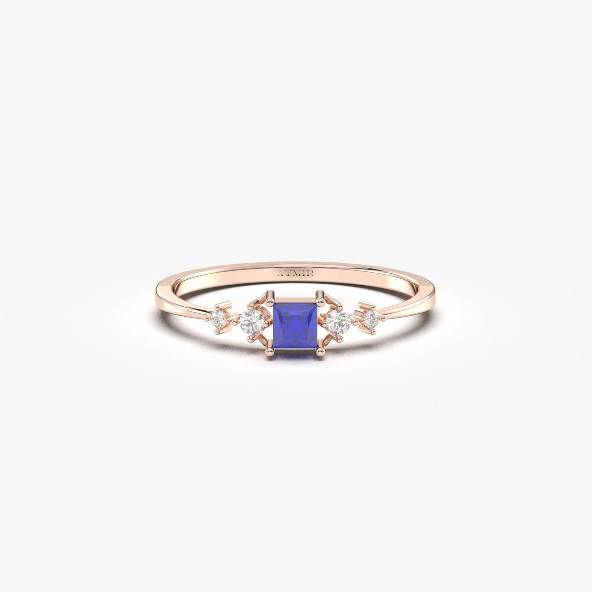 Rose gold blue-stone princess ring, front view