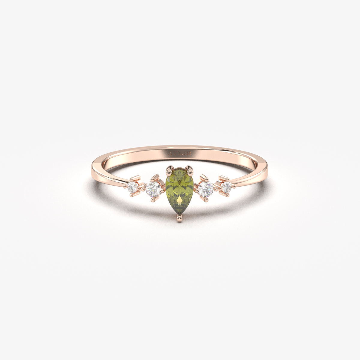 Rose gold green-stone pear ring, front view