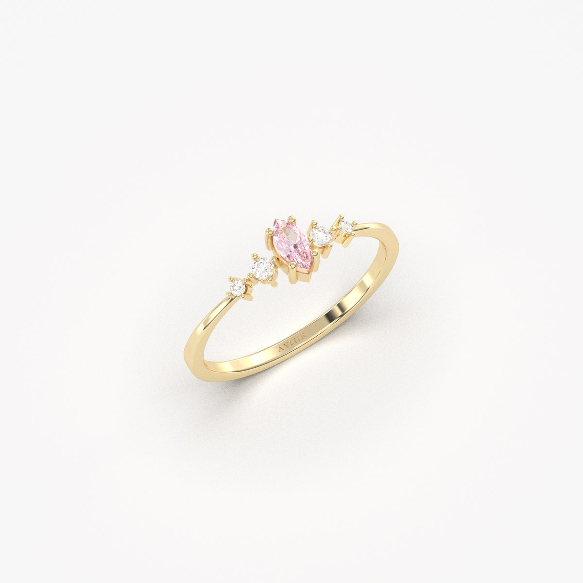 Yellow gold pink-stone marquise ring, angled view