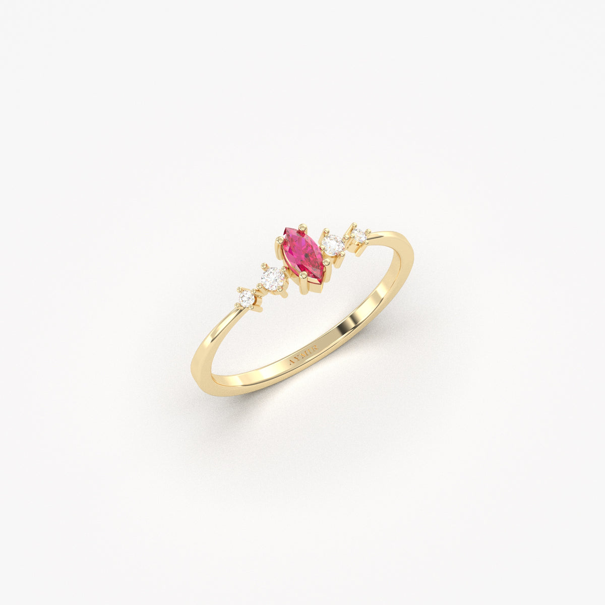 Yellow gold red-stone marquise ring, angled view