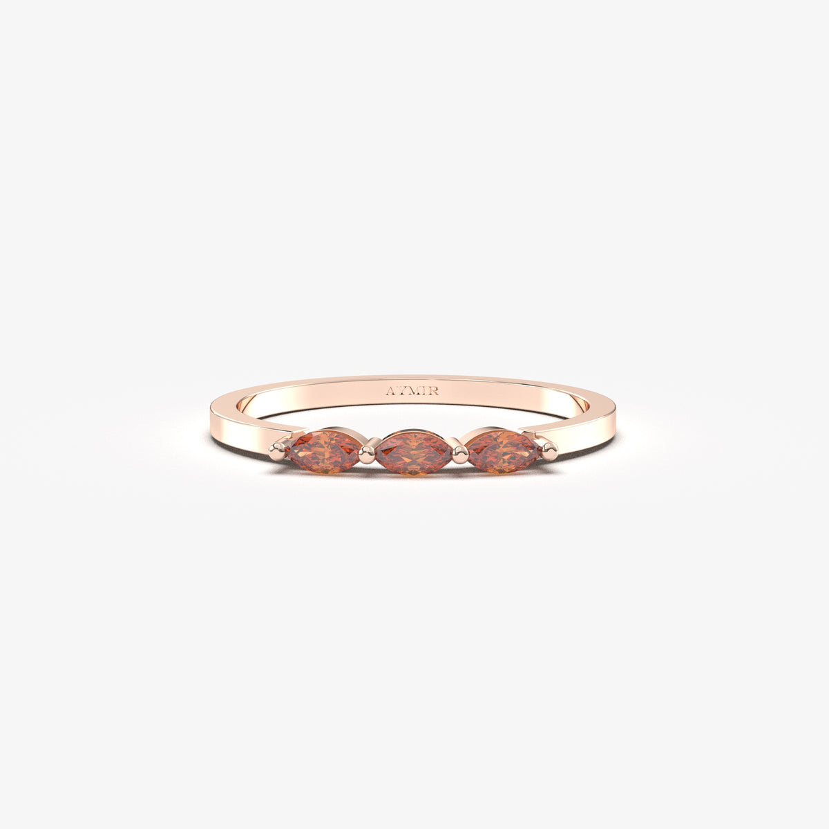14K rose gold three stone marquise ring with orange-red marquise stones, front view