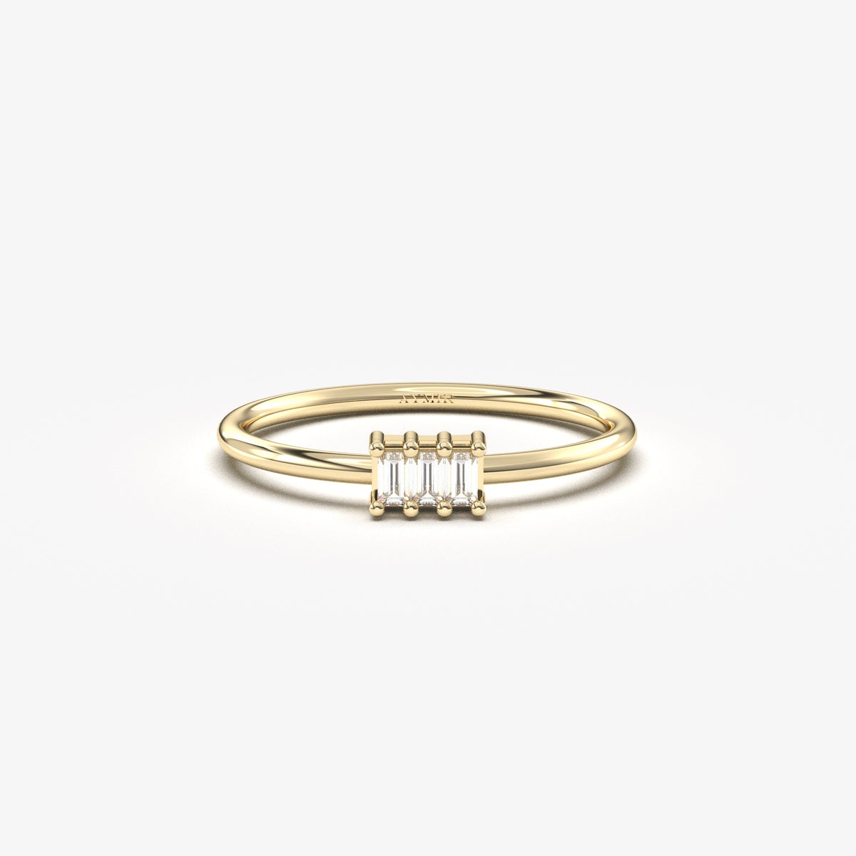 14K yellow gold three baguette ring with cubic zirconia, front view