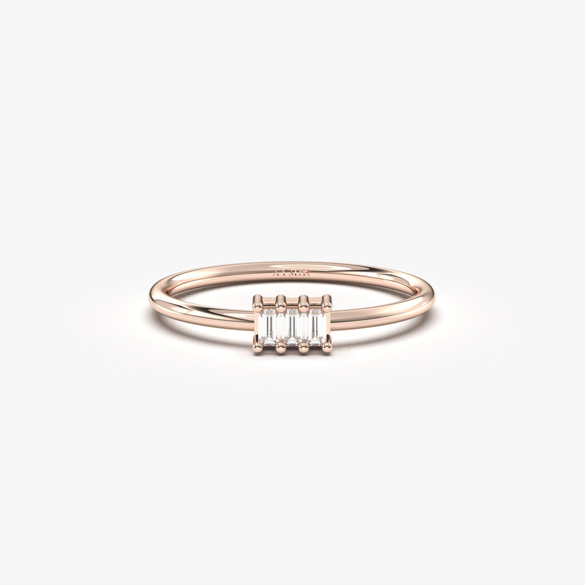 10K rose gold three baguette ring with cubic zirconia, front view