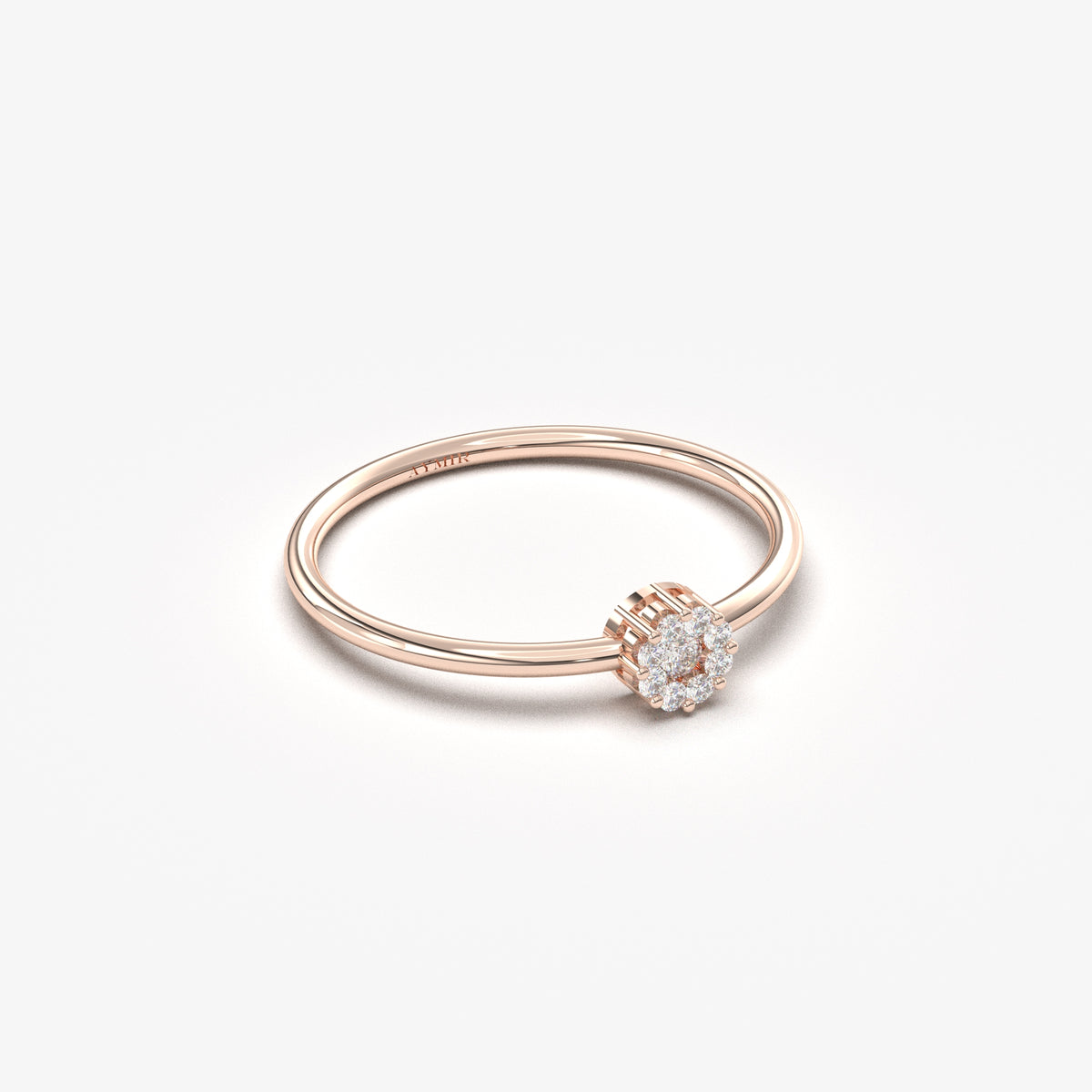 18K rose gold round cluster ring with cubic zirconia, angled view