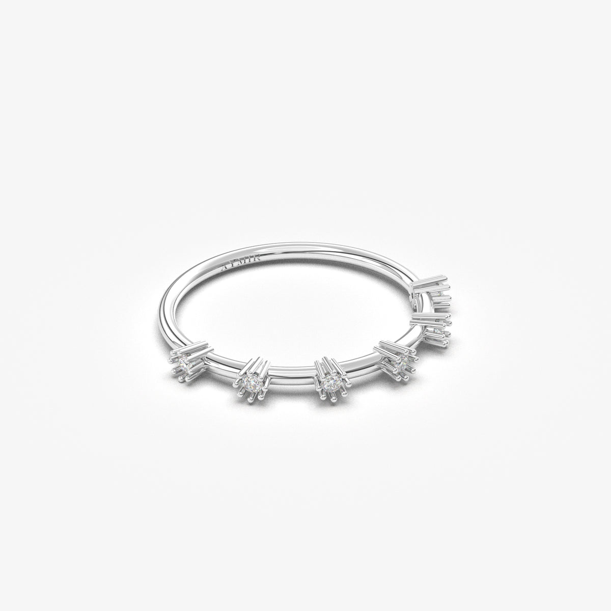 18K white gold six stone station ring with cubic zirconia, angled view