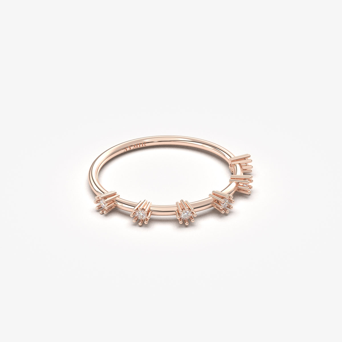 14K rose gold six stone station ring with cubic zirconia, angled view