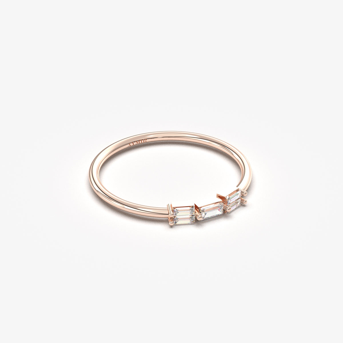 10K rose gold five baguette ring with cubic zirconia, angled view