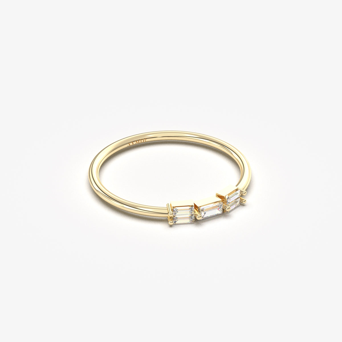 18K yellow gold five baguette ring with natural diamonds, angled view