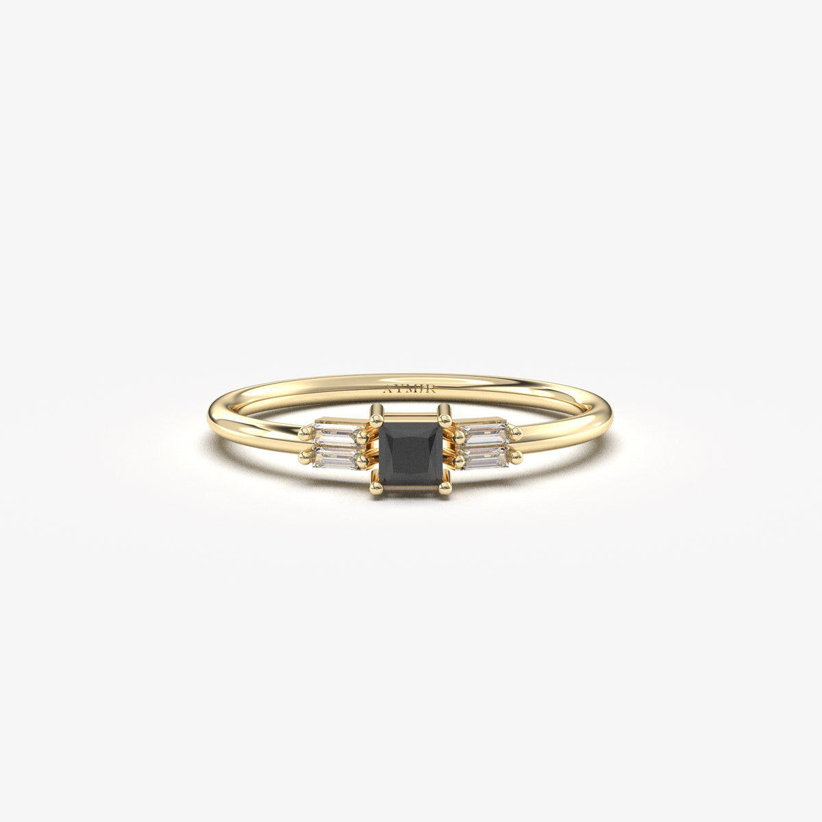 Yellow gold black-stone baguette ring, front view