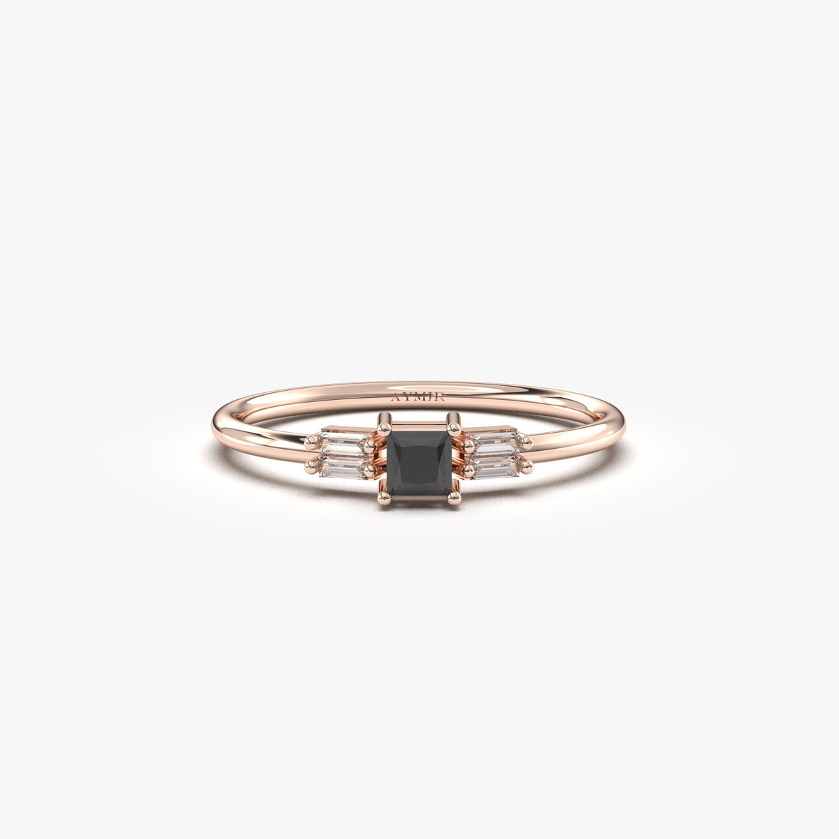 Rose gold black-stone baguette ring, front view