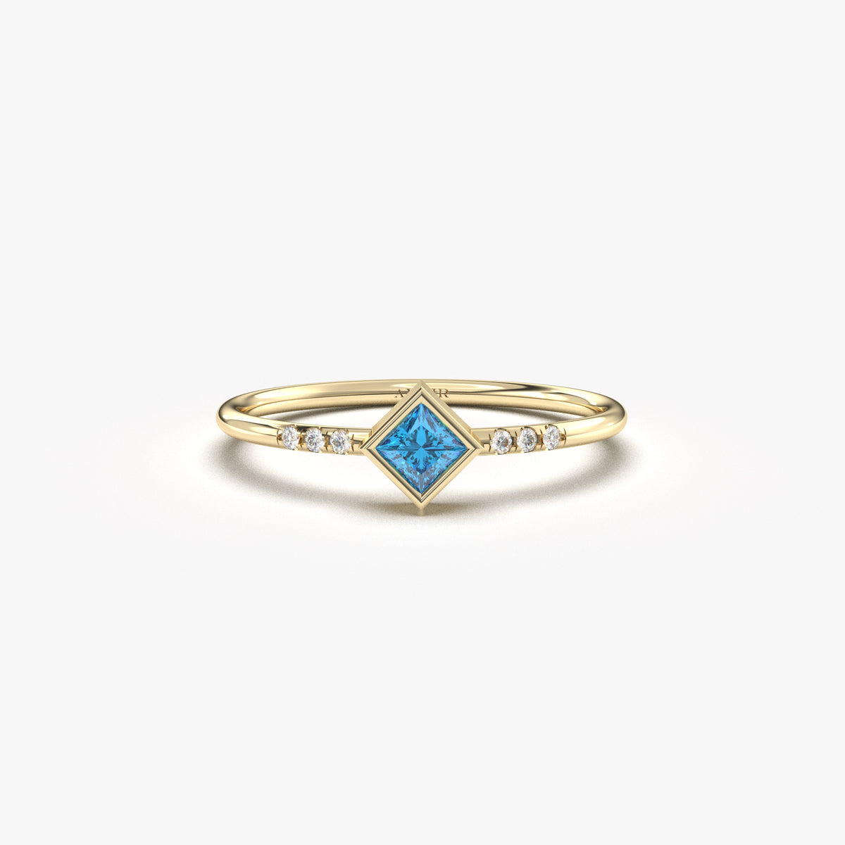 10K yellow gold blue-stone princess ring with cubic zirconia, front view
