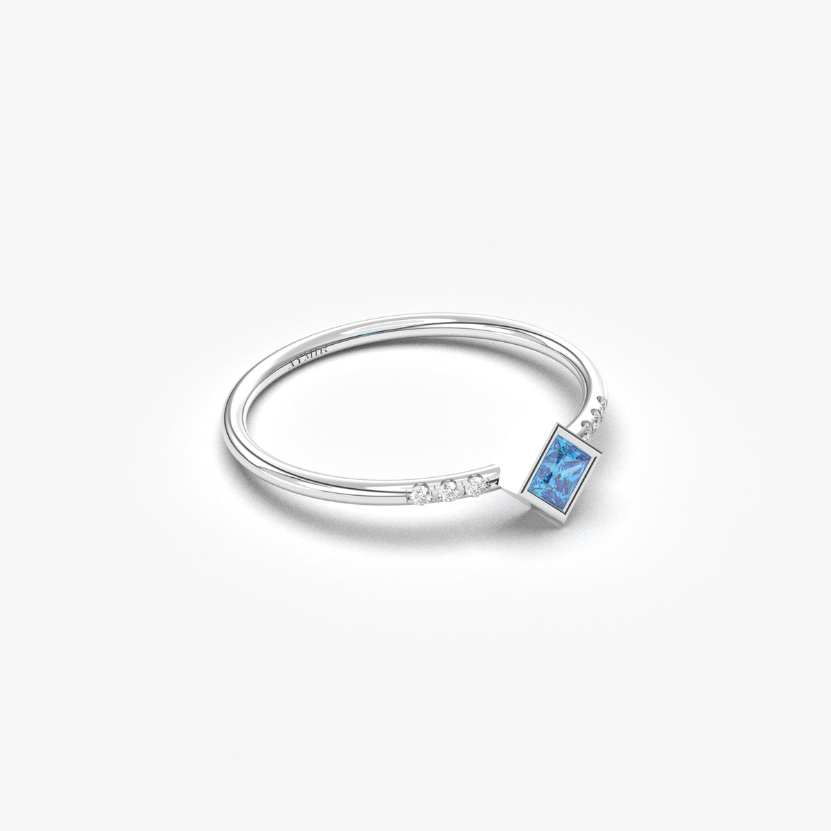 10K white gold blue-stone princess ring with cubic zirconia, angled view