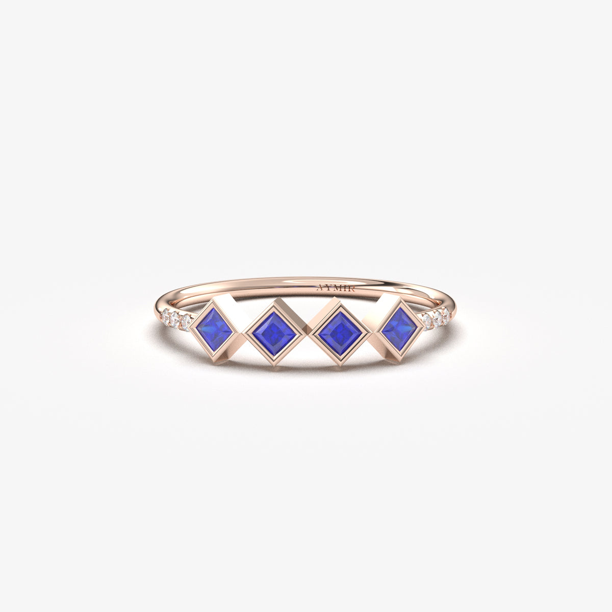 18K rose gold blue stone four princess ring with cubic zirconia, front view