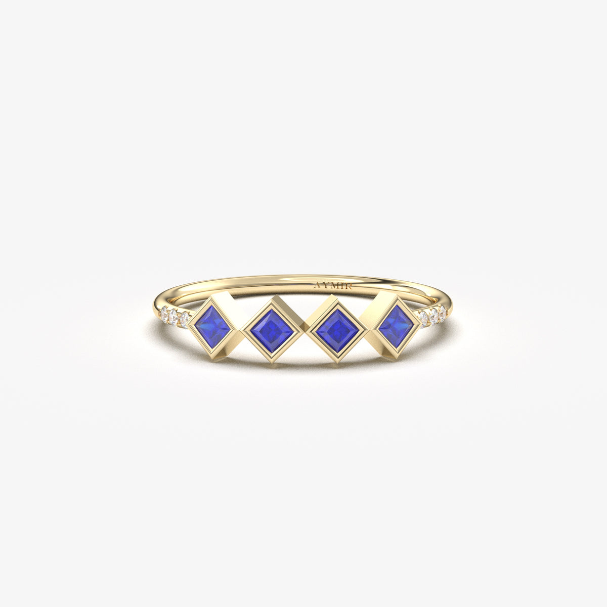 10K yellow gold blue stone four princess ring with cubic zirconia, front view