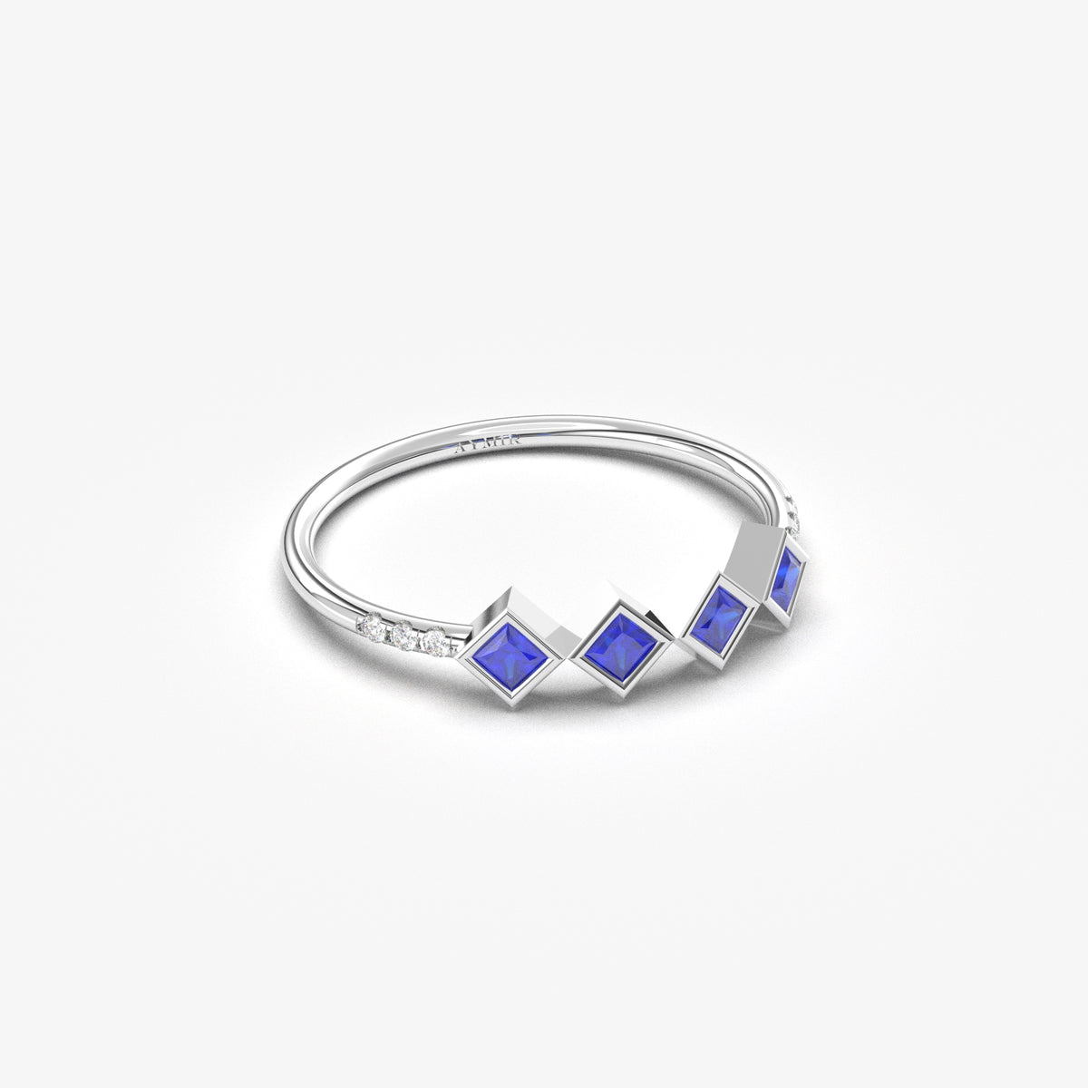 18K white gold blue stone four princess ring with cubic zirconia, angled view