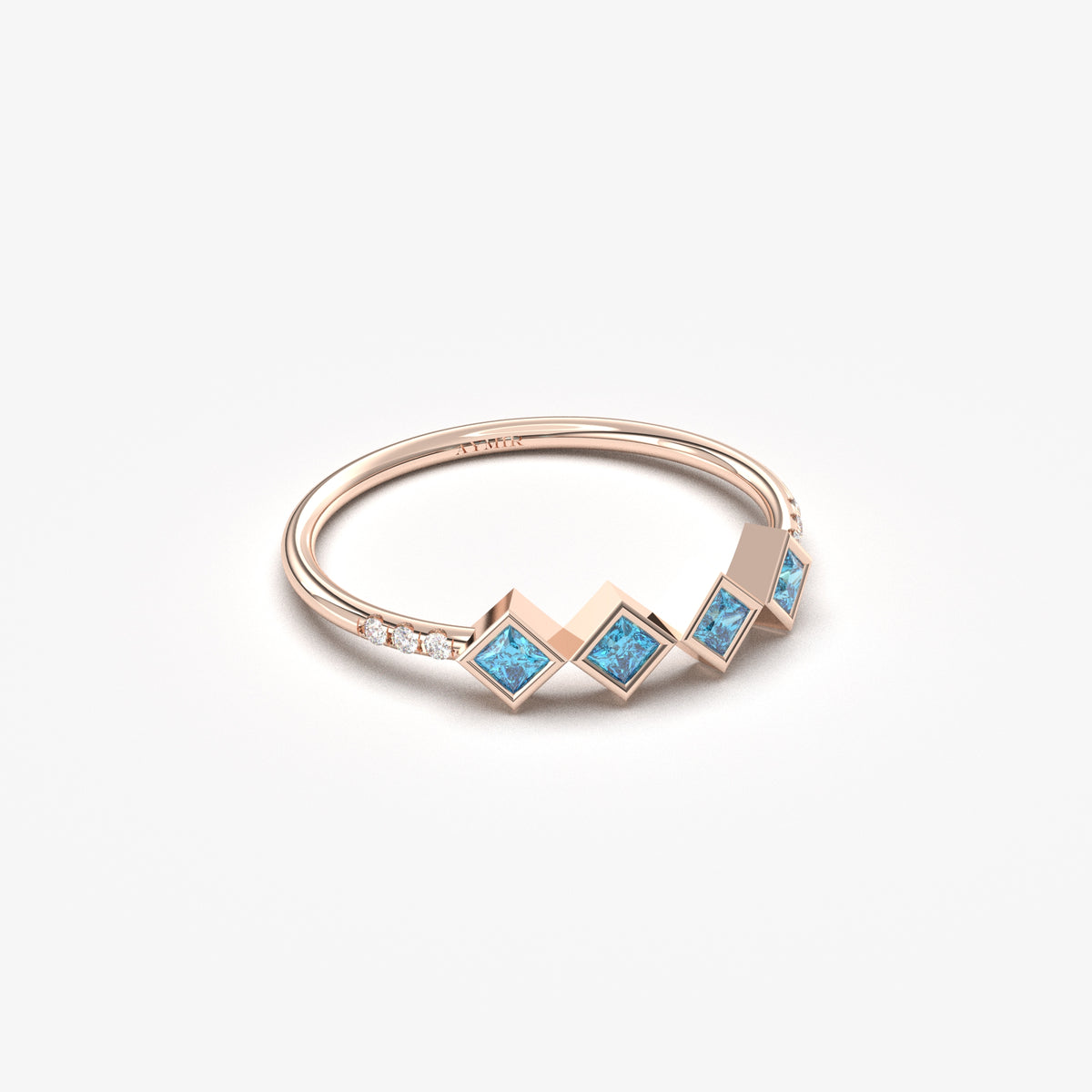18K rose gold sky blue stone four princess ring with cubic zirconia, angled view