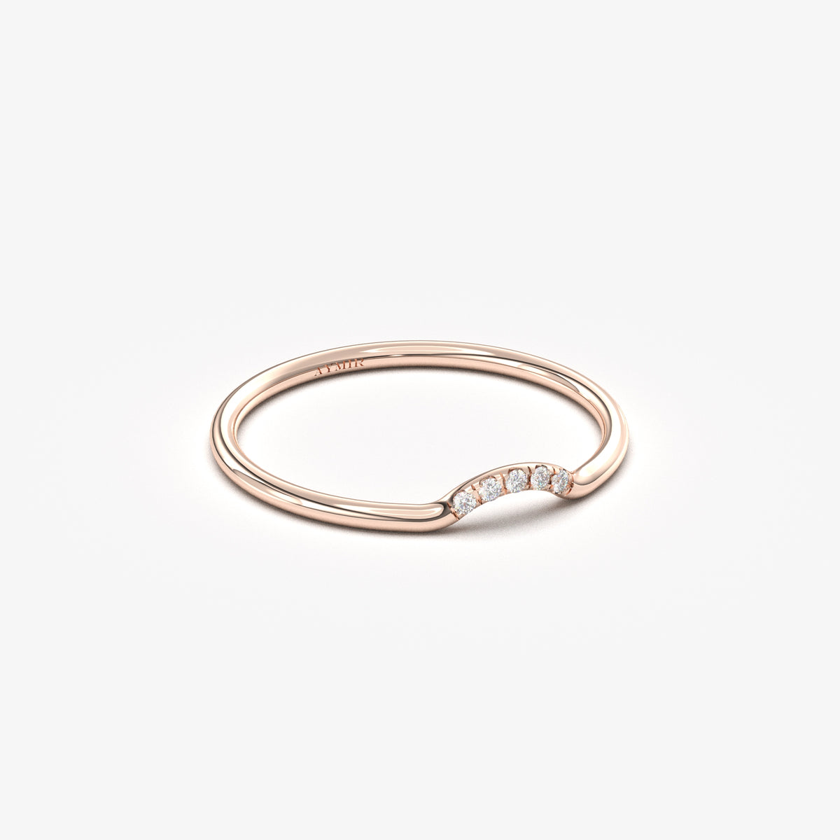 14K rose gold curved contour ring with cubic zirconia, angled view