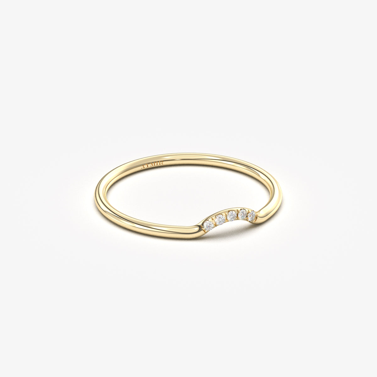 14K yellow gold curved contour ring with cubic zirconia, angled view