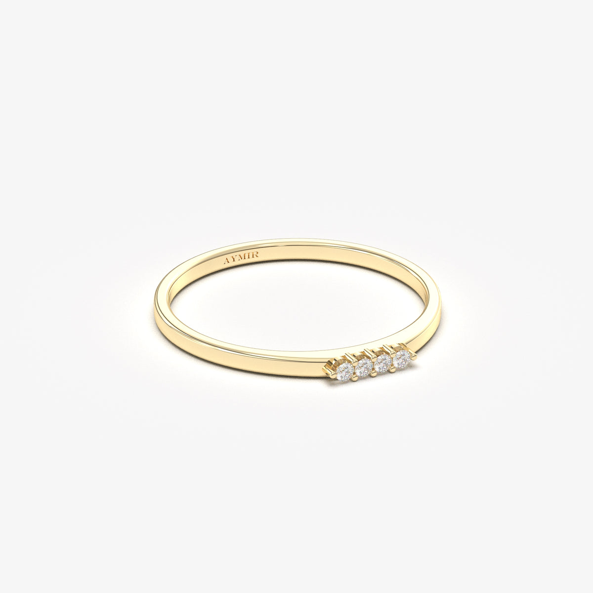 10K yellow gold four stone bar ring with natural diamonds, angled view