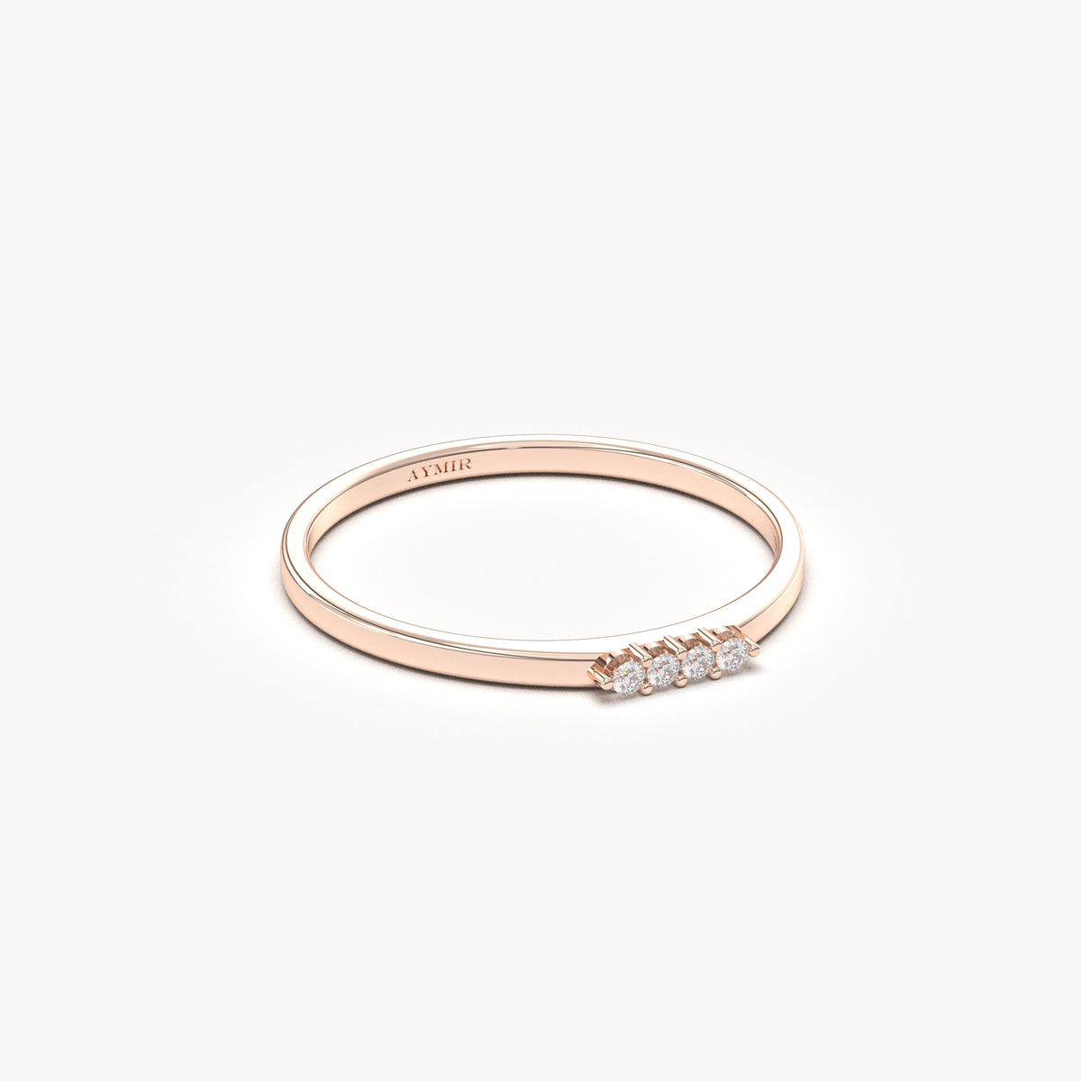 14K rose gold four stone bar ring with natural diamonds, angled view