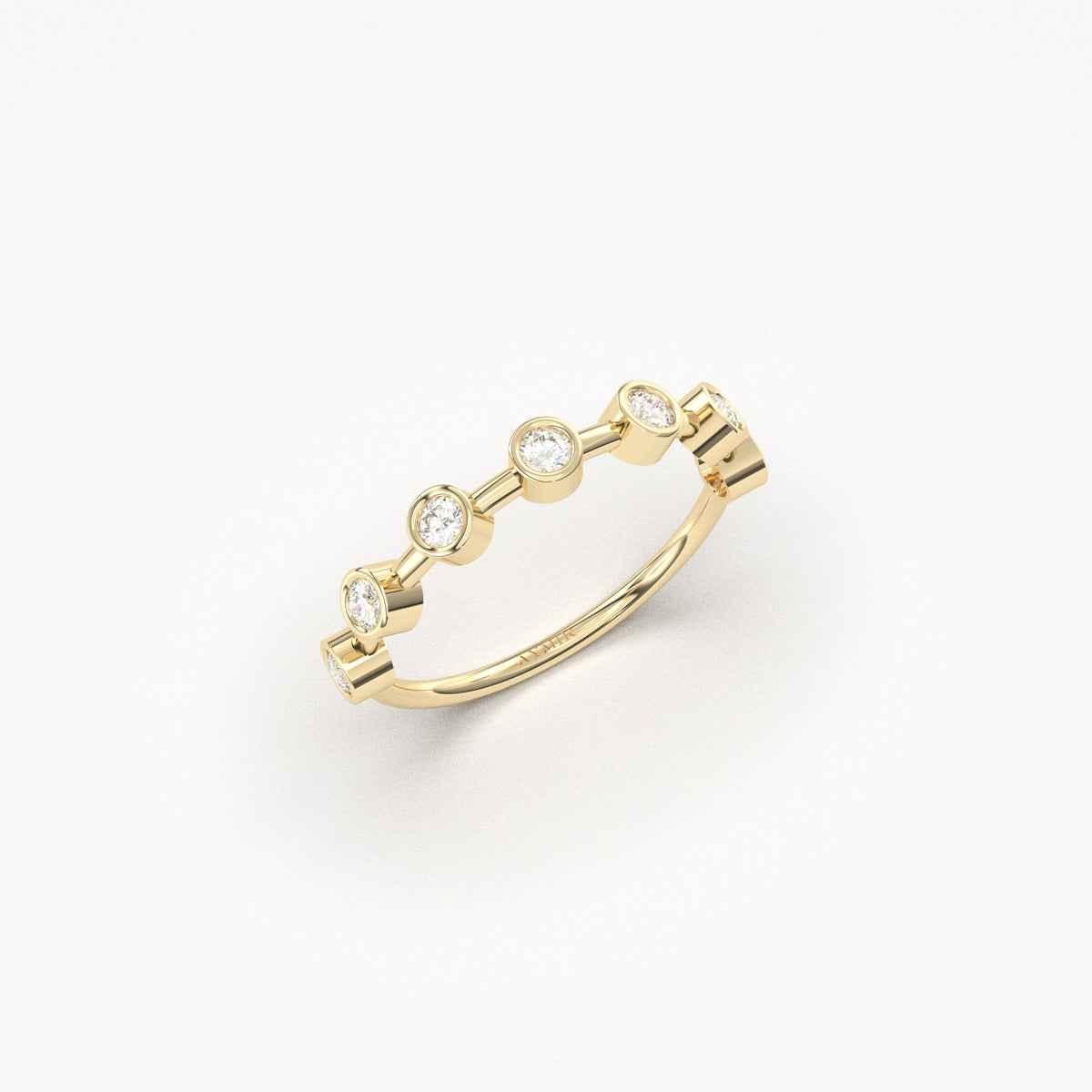 18K yellow gold seven stone bezel ring with natural diamonds, side view