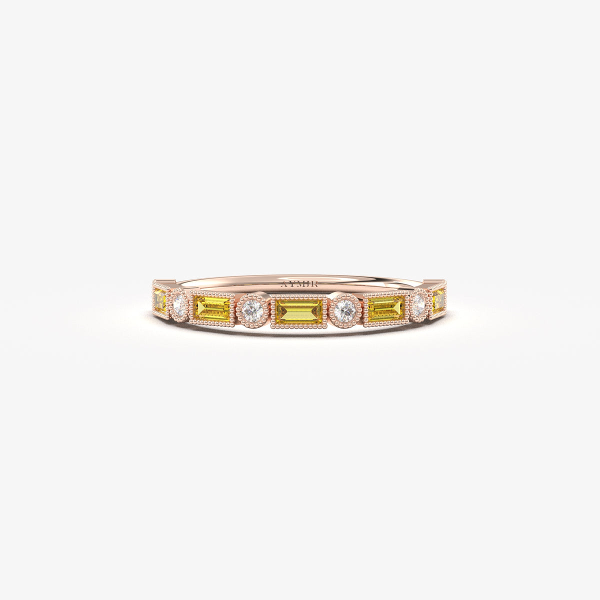 Rose gold yellow-stone baguette ring, front view