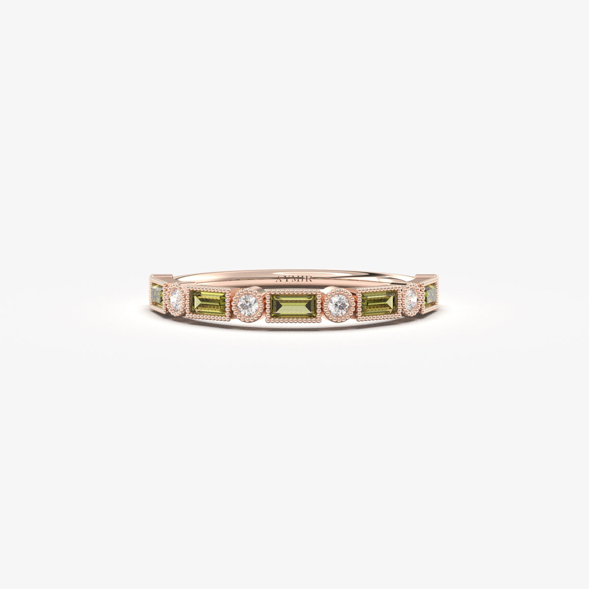 Rose gold green-stone baguette ring, front view