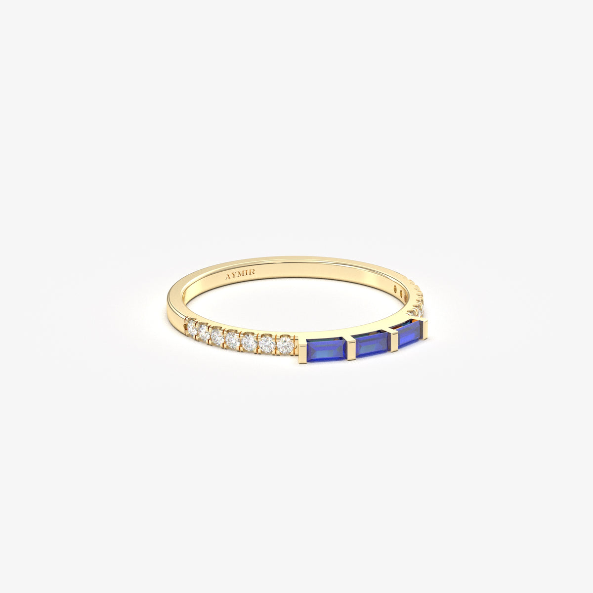 Yellow gold blue-stone baguette ring, angled view