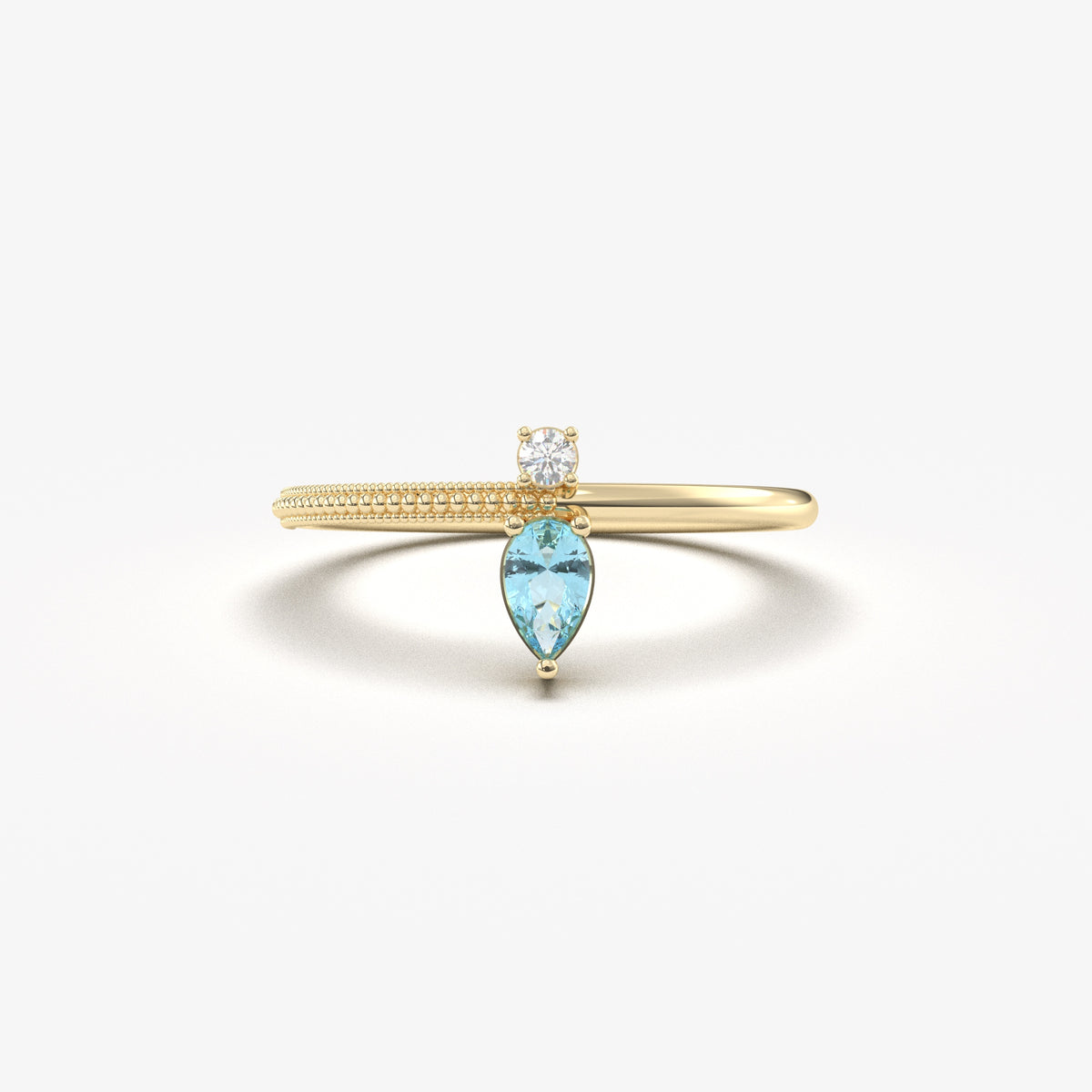 Yellow gold aqua-blue-stone pear ring, front view