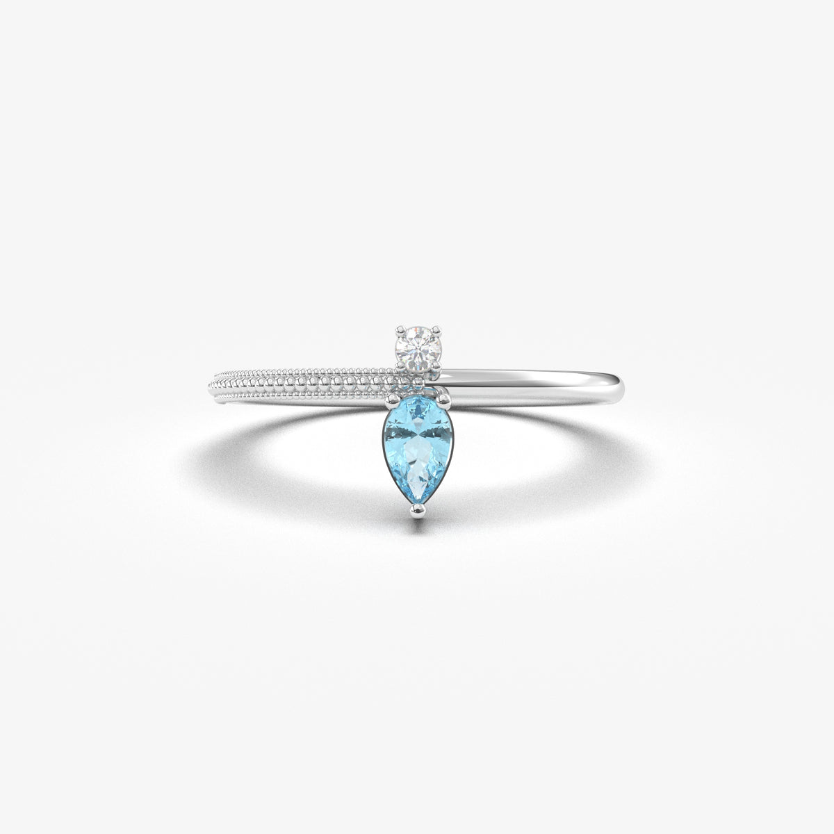 White gold aqua-blue-stone pear ring, front view