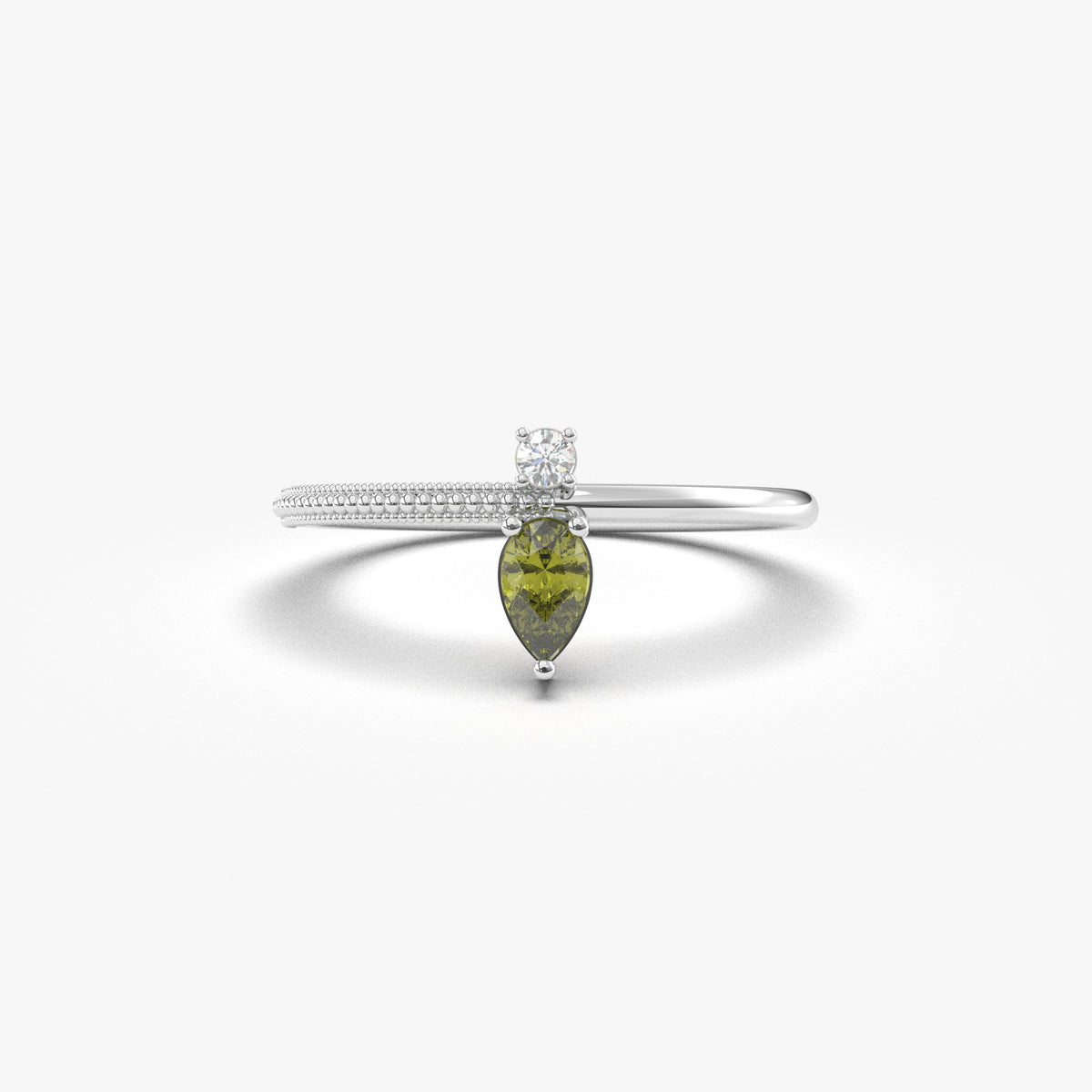 White gold green-stone pear ring, front view