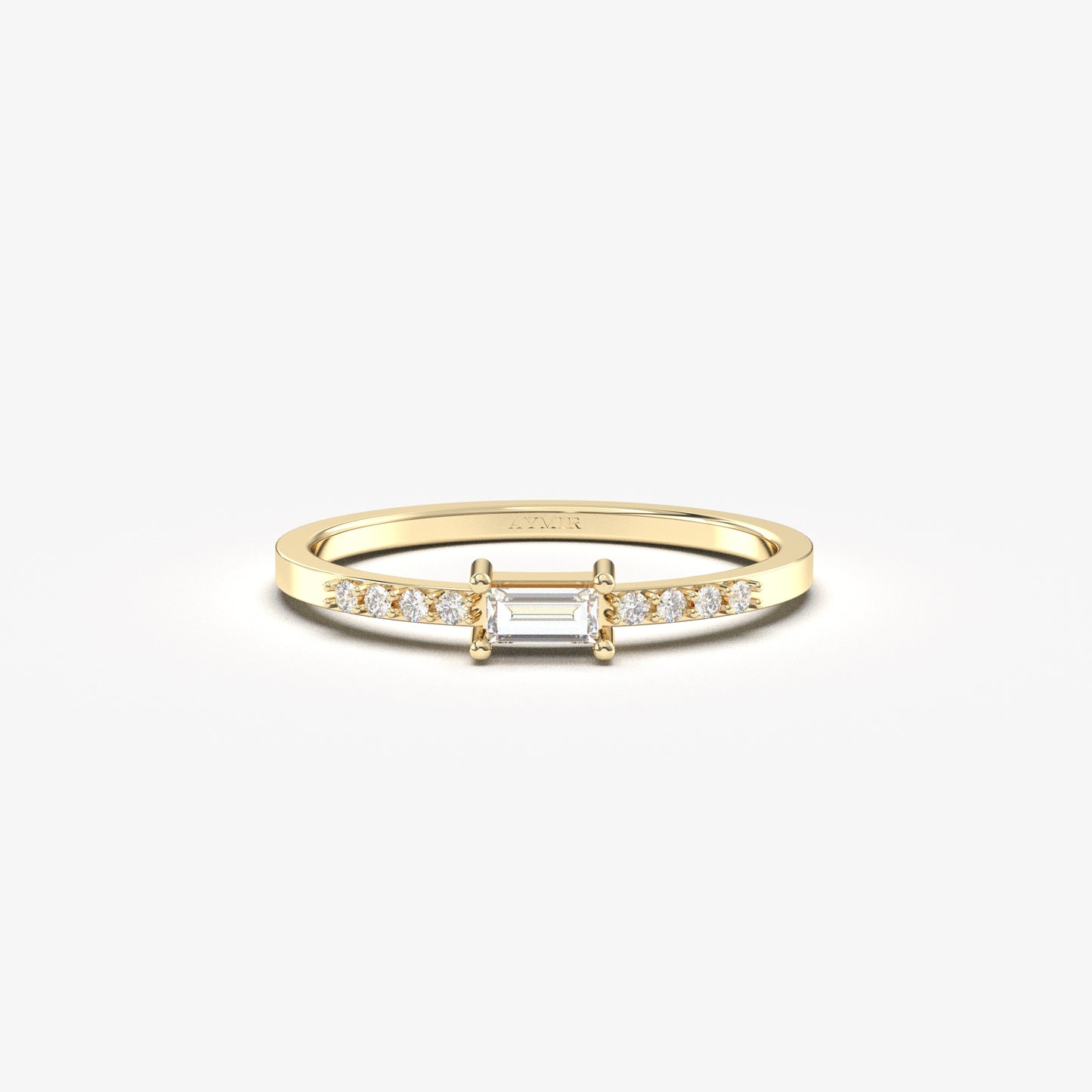 18K yellow gold east-west baguette ring with cubic zirconia, front view