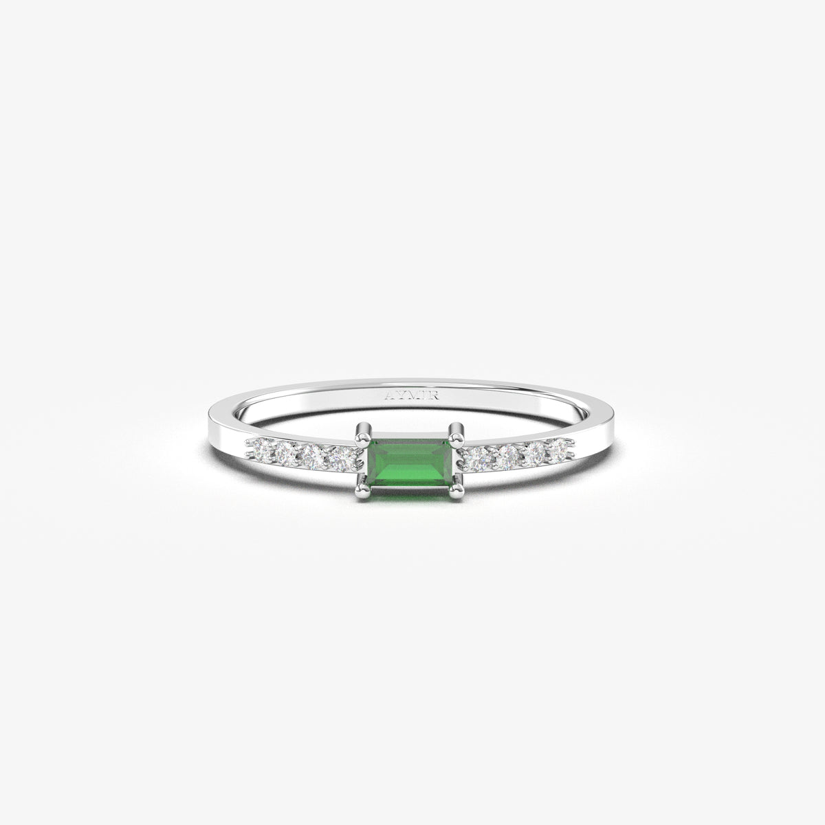White gold green-stone baguette ring, front view