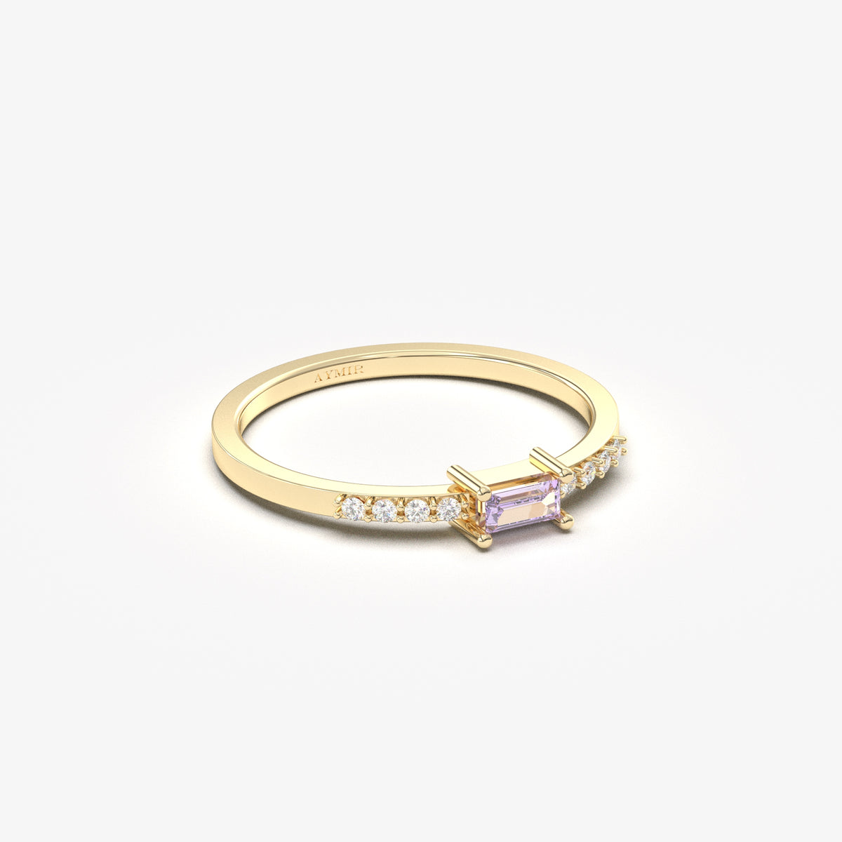 Yellow gold lavender-stone baguette ring, angled view