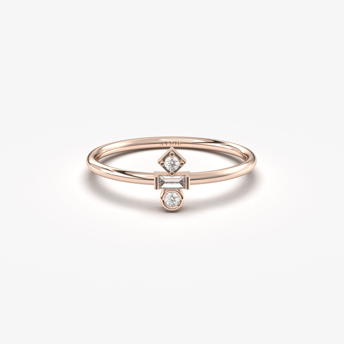 Rose gold three-stone baguette ring, front view