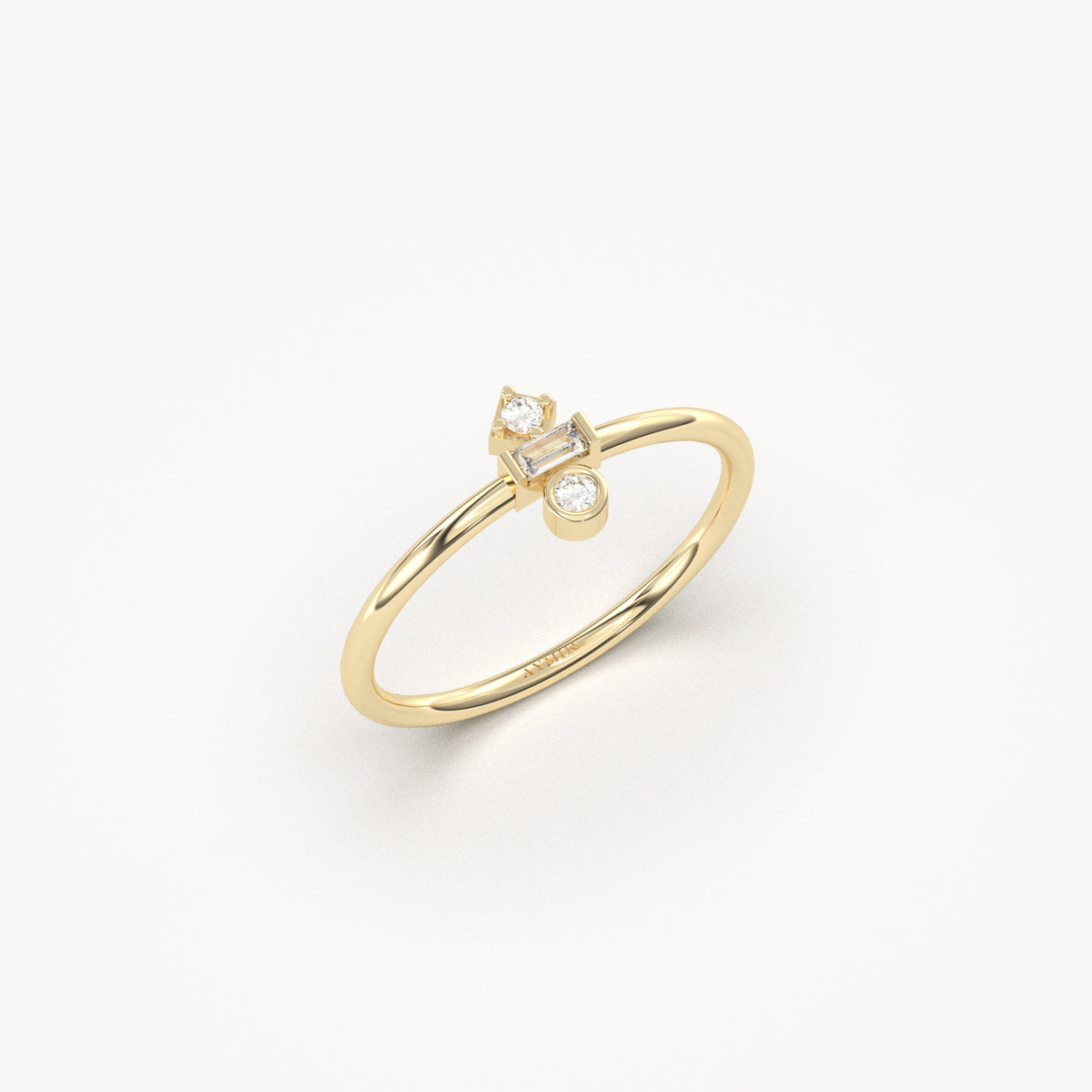 Yellow gold three-stone baguette ring, angled view