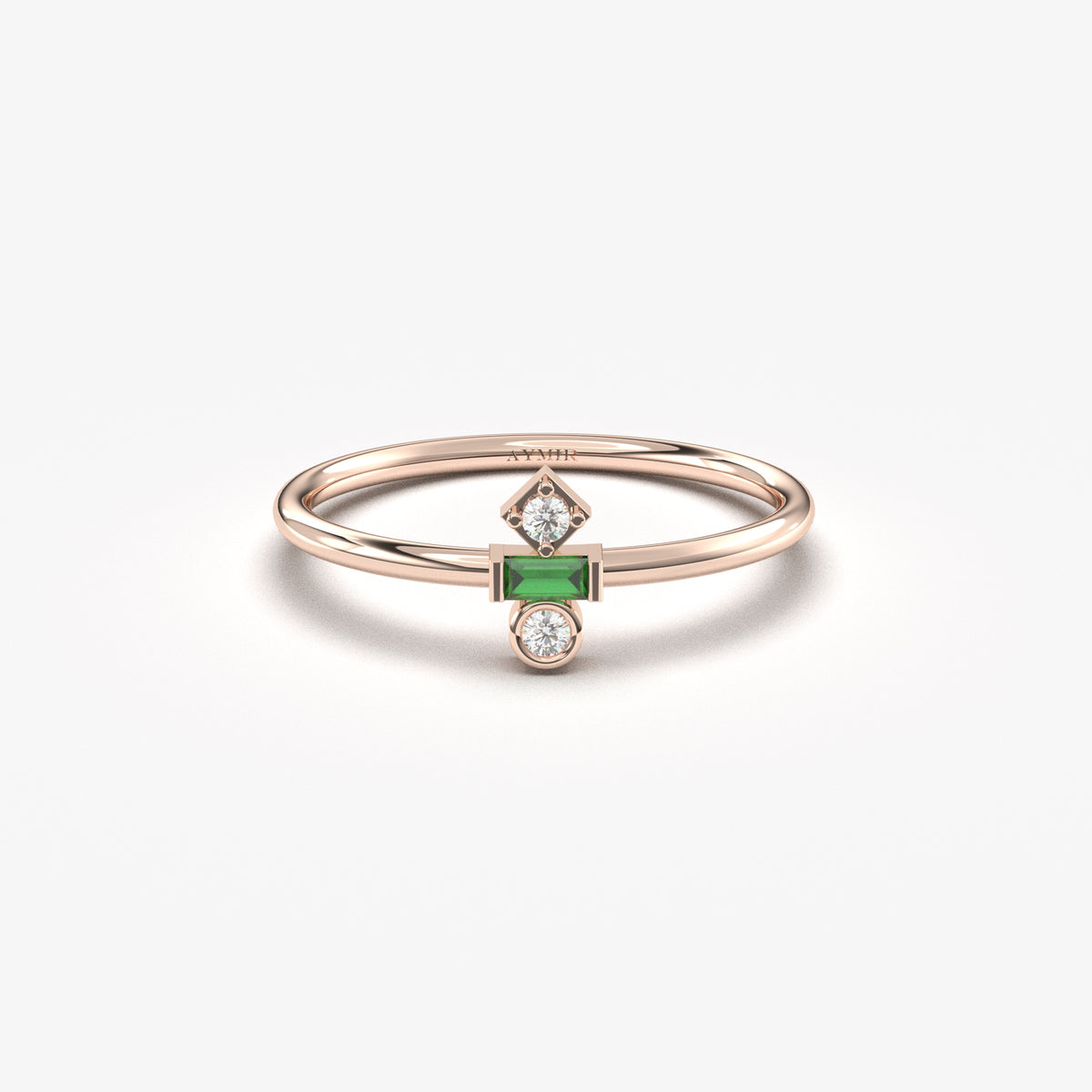 Rose gold green-stone baguette ring, front view